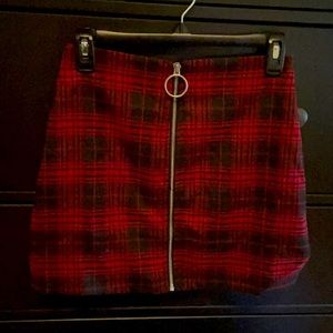Thigh length, short, red plaid skirt. Worn twice max.